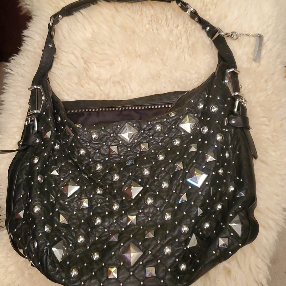 DKNY black leather purse embellished with studs